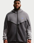 R.M Grey on dark grey Nike tech hoodie